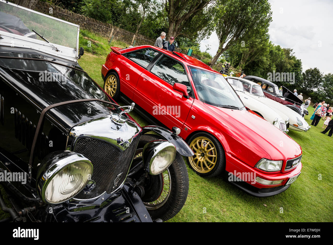 Angled view of classic cars on show at summer fete Derbyshire England