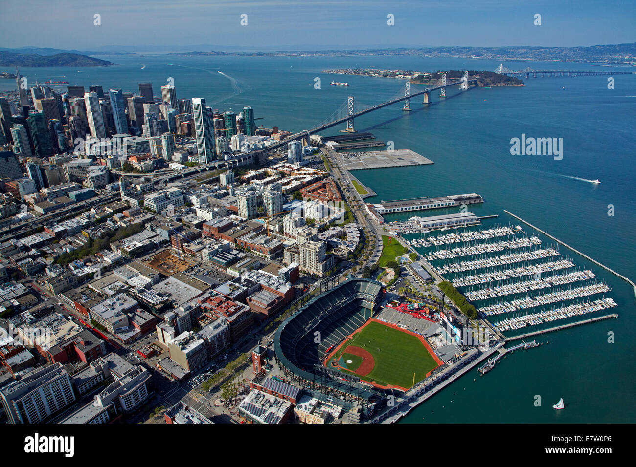 AT&T Park / Giants Ballpark, South Beach Marina, downtown San Francisco, and Bay Bridge, California, USA - aerial Stock Photo