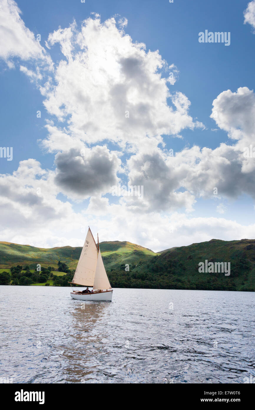 A sailing dinghy in the English Lake District on Ullswater, Cumbria UK