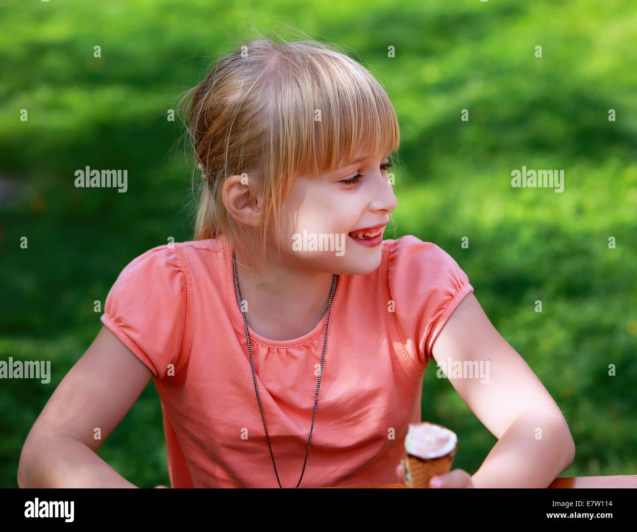 Portrait a young girl in the park Stock Photo - Alamy