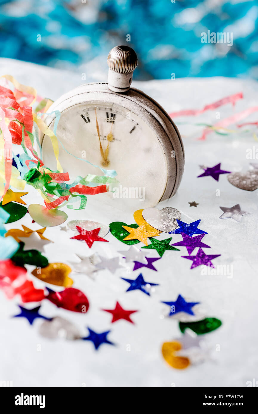 Watch frozen in ice.New year celebrations. Stock Photo