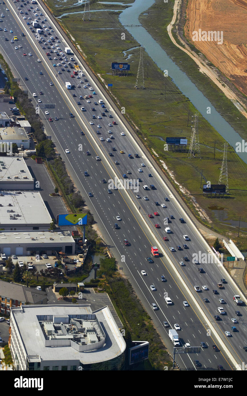 Traffic on Bayshore Freeway ( U.S. Route 101), San Carlos, San Francisco, California, USA - aerial Stock Photo