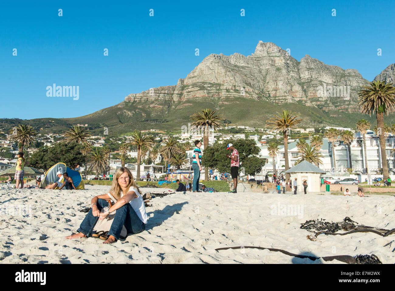 People on the beach of Camps Bay, Cape Town, South Africa Stock Photo