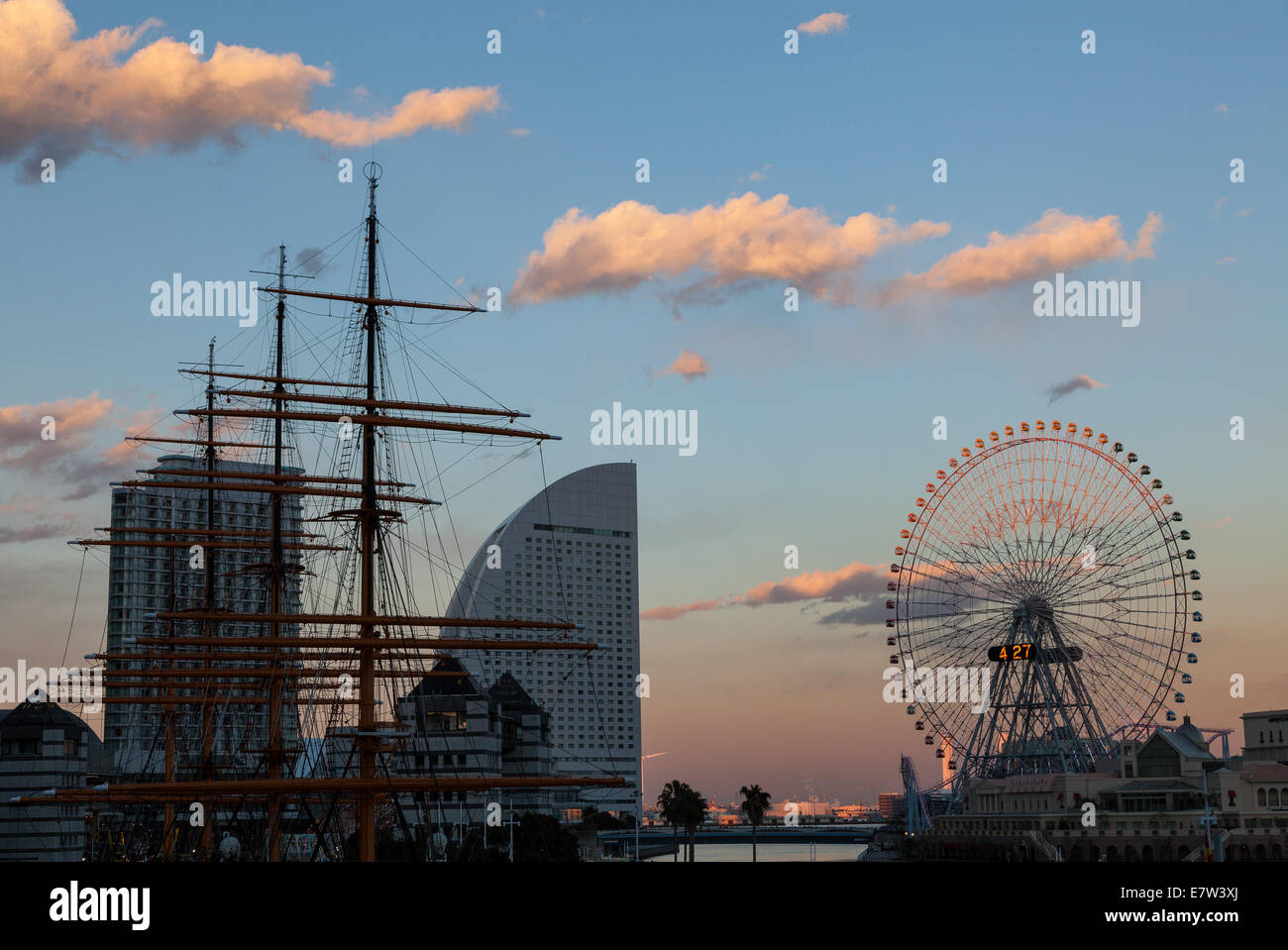 Yokohama skyline at sunset with the Grand Inter-Continental hotel in the centre and Cosmo Clock ferris wheel to the right. Japan Stock Photo