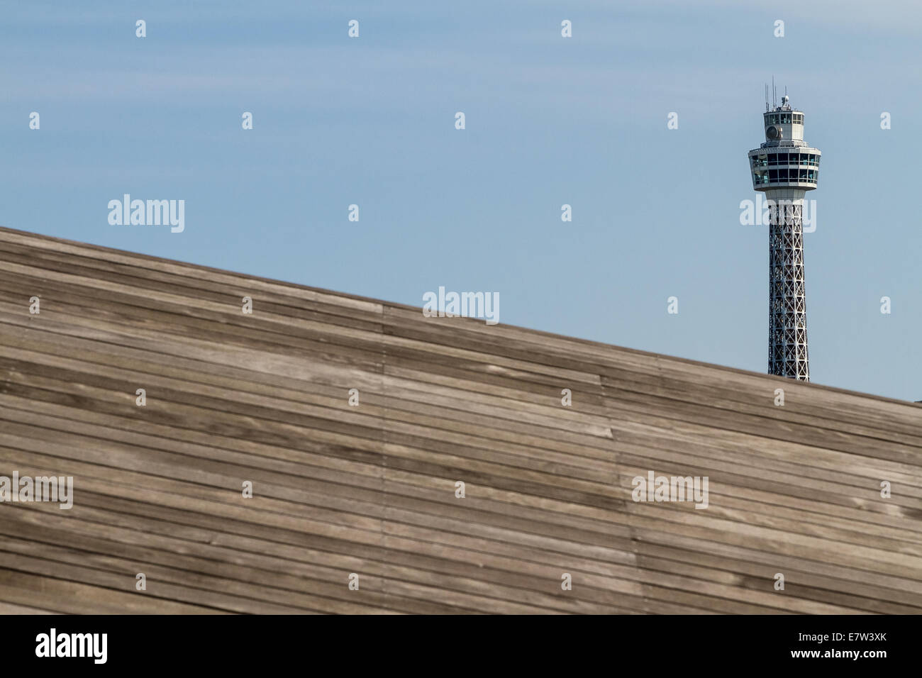 Yokohama Marine tower seen above the wooden decks of Osanbashi Pier in Yokohama, Kanagawa, Japan. Stock Photo