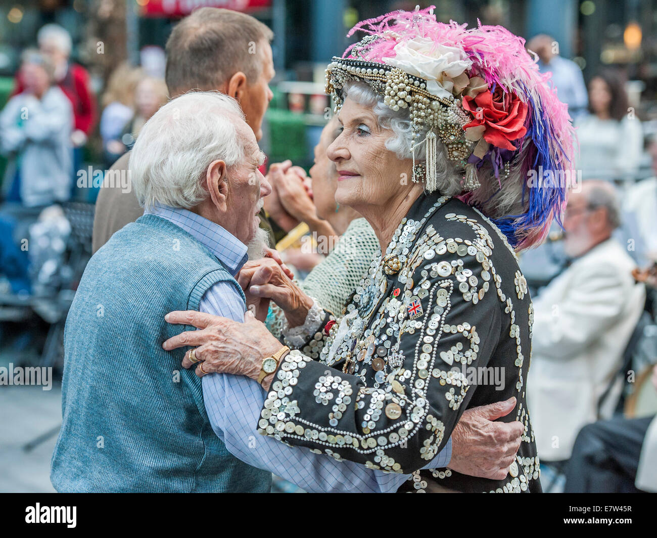 London, UK. 24th September, 2014. A Pearly Queen leads the last Spitalfields Tea Dance of 2014 - with music by the New Covent Garden Dance Orchestra. Spitalfields Market, London, UK 24 Sept 2014. Credit:  Guy Bell/Alamy Live News Stock Photo