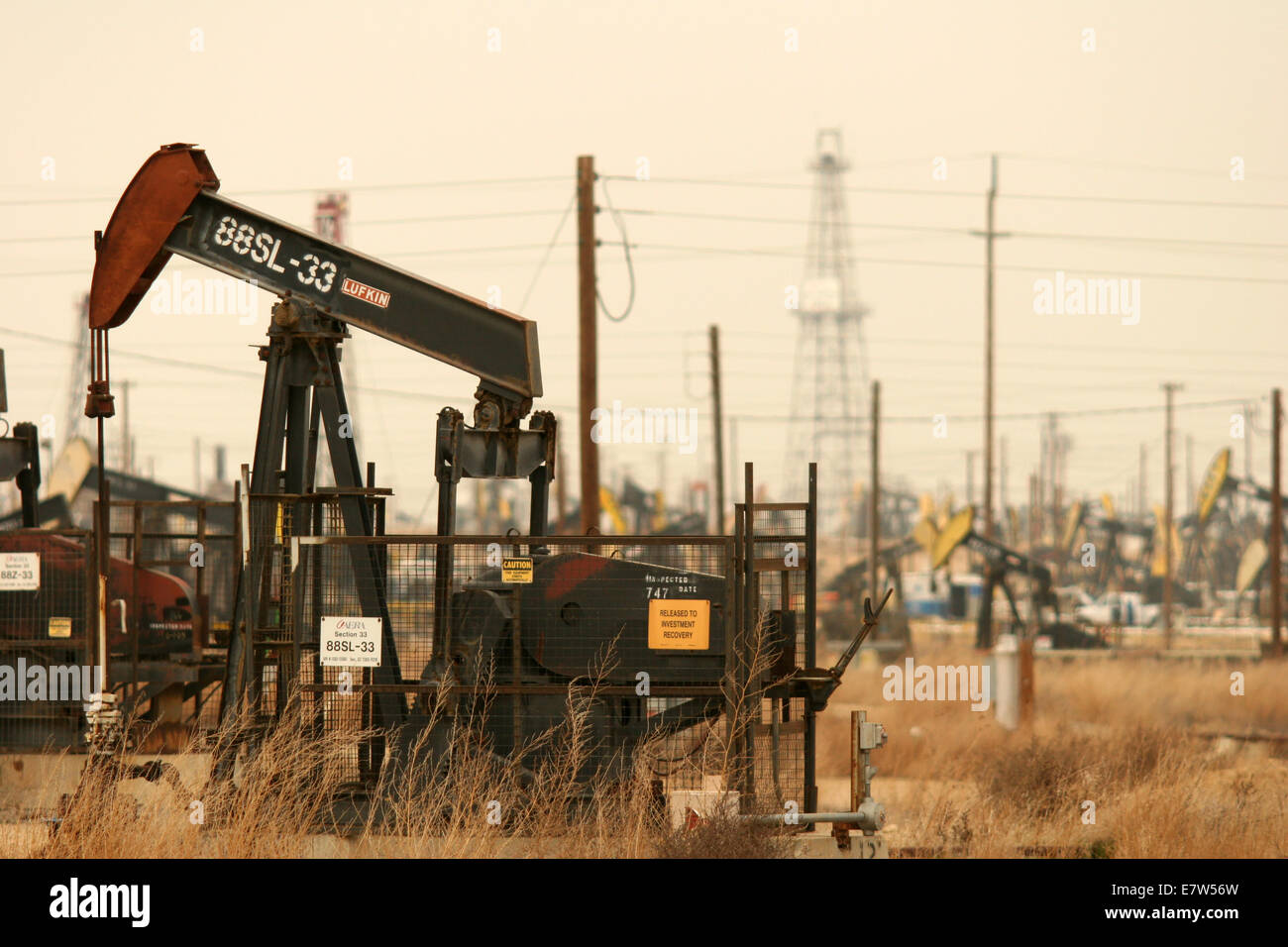 Busy Pumpjacks at Work in a California Oil Field Stock Photo