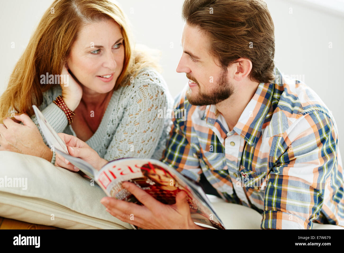 Couple relaxing indoors Stock Photo