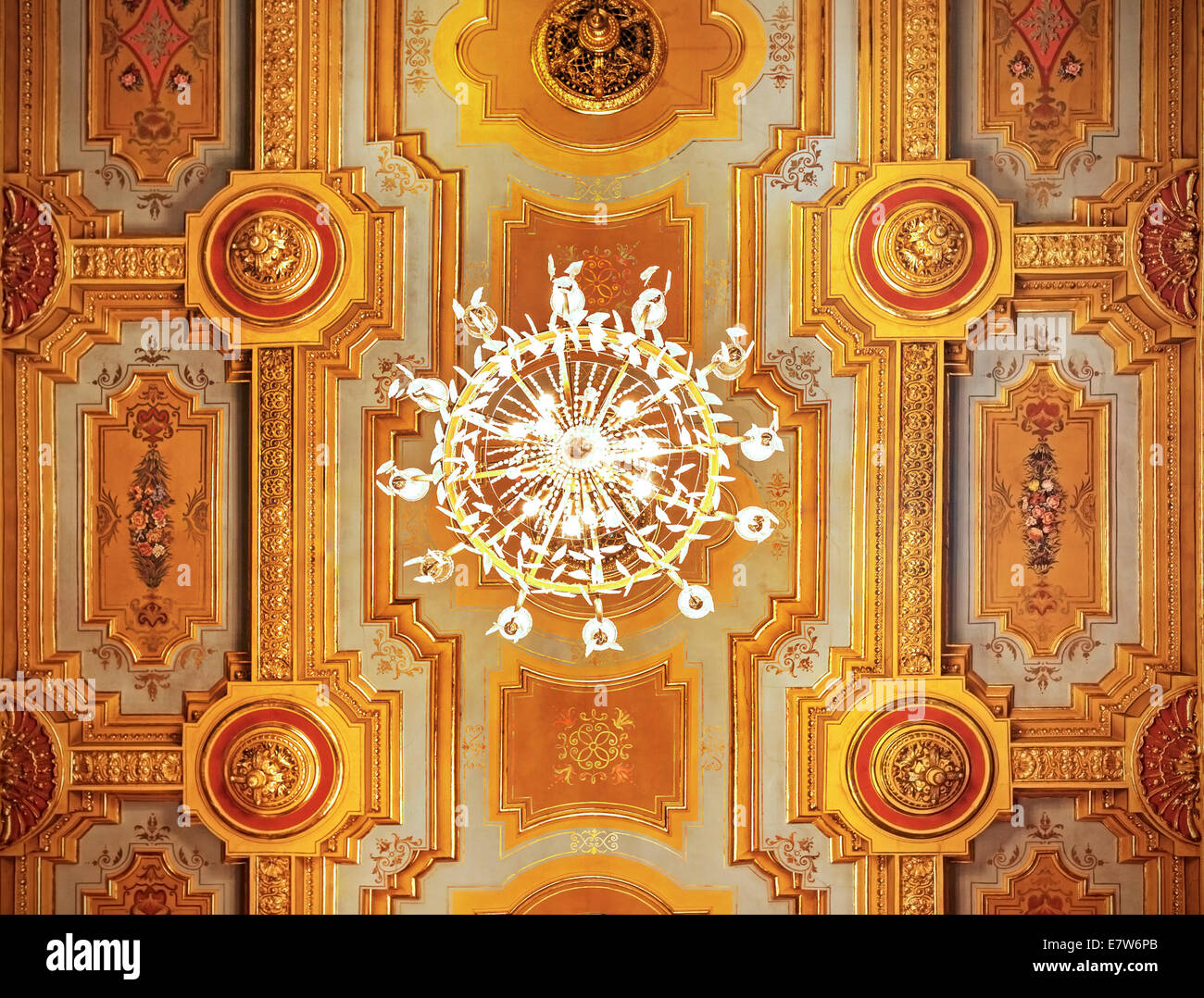 Antique ceiling with chandelier, Torun, Poland. Stock Photo