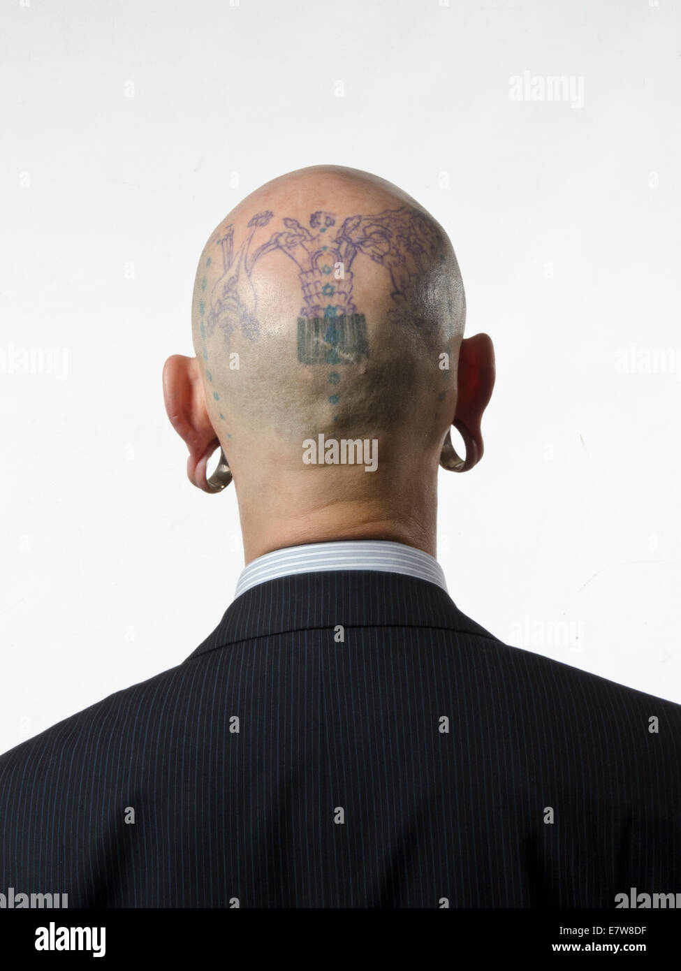 tattooed bald head