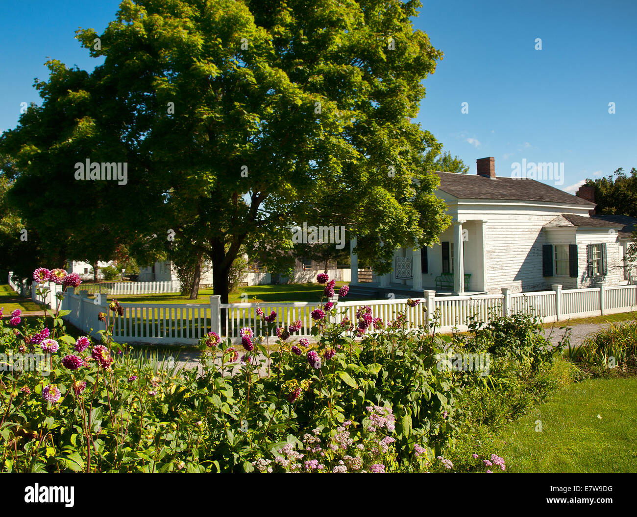 home with picket fence and garden Stock Photo