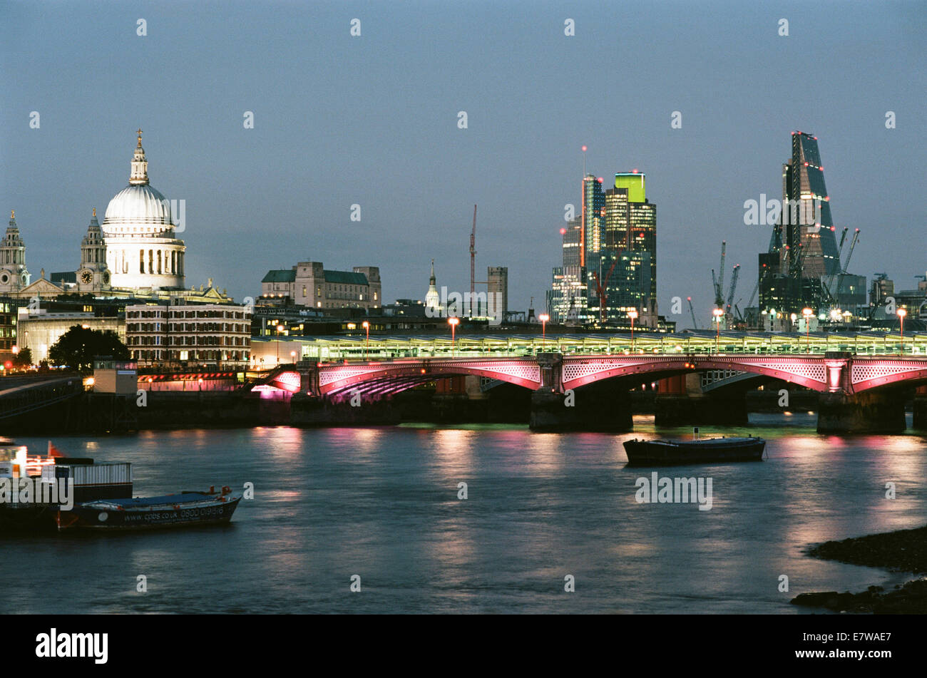 City of London UK and St Paul's cathedral at dusk from Waterloo Bridge Stock Photo