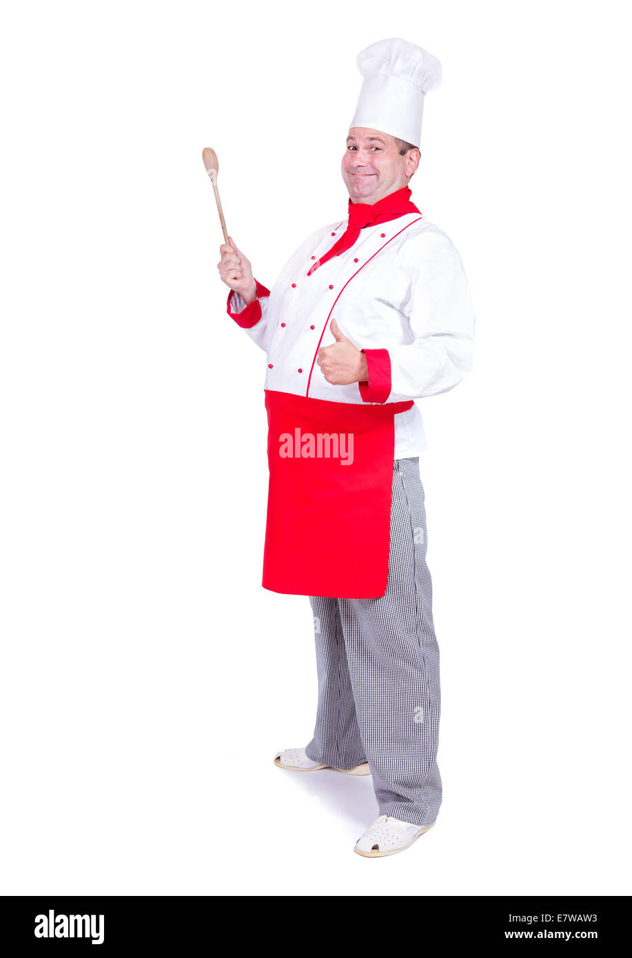 cheerful chef standing with gesture thumb up Stock Photo