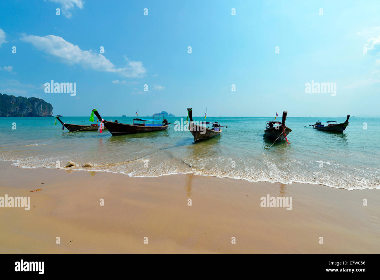 Traditional thai boats at beach in Ao Nang, Krabi province, Thailand Stock Photo