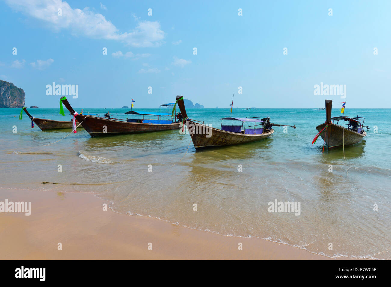 Traditional thai boats at beach in Ao Nang, Krabi province, Thailand Stock Photo