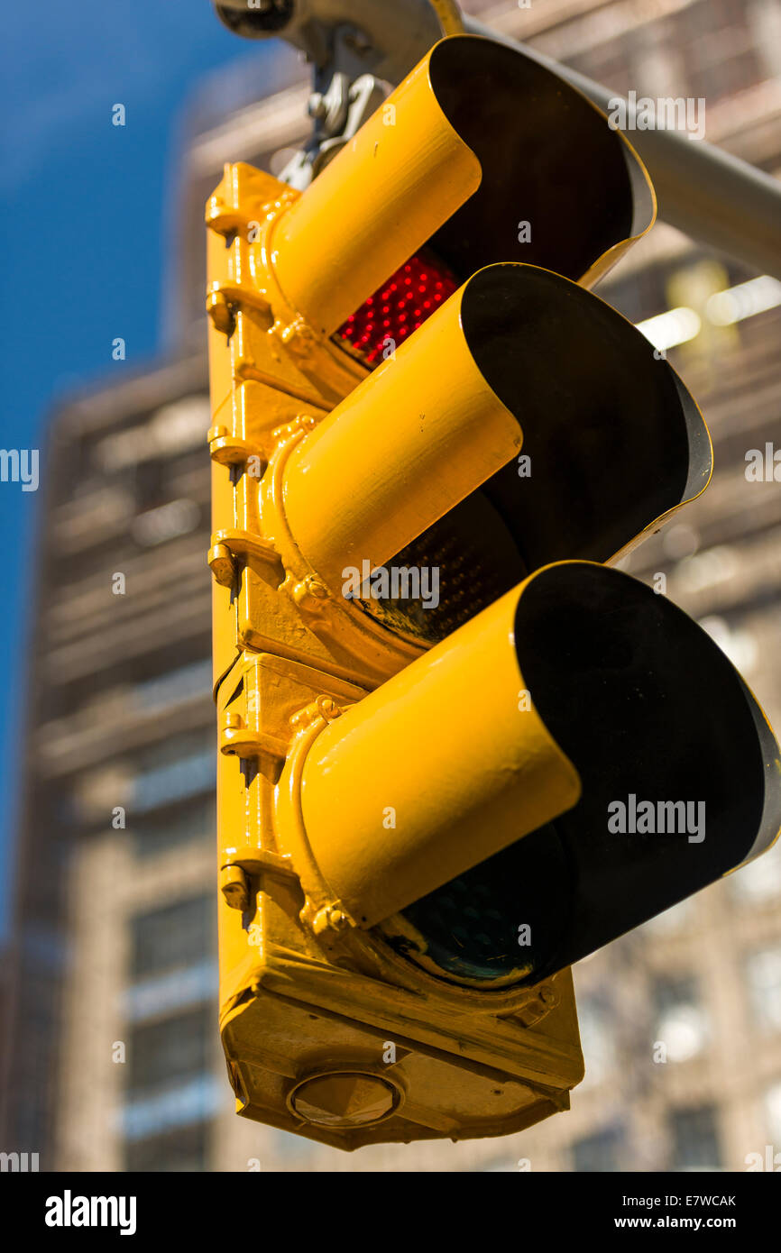 American Traffic Lights above a busy  intersection in New York city - USA Stock Photo