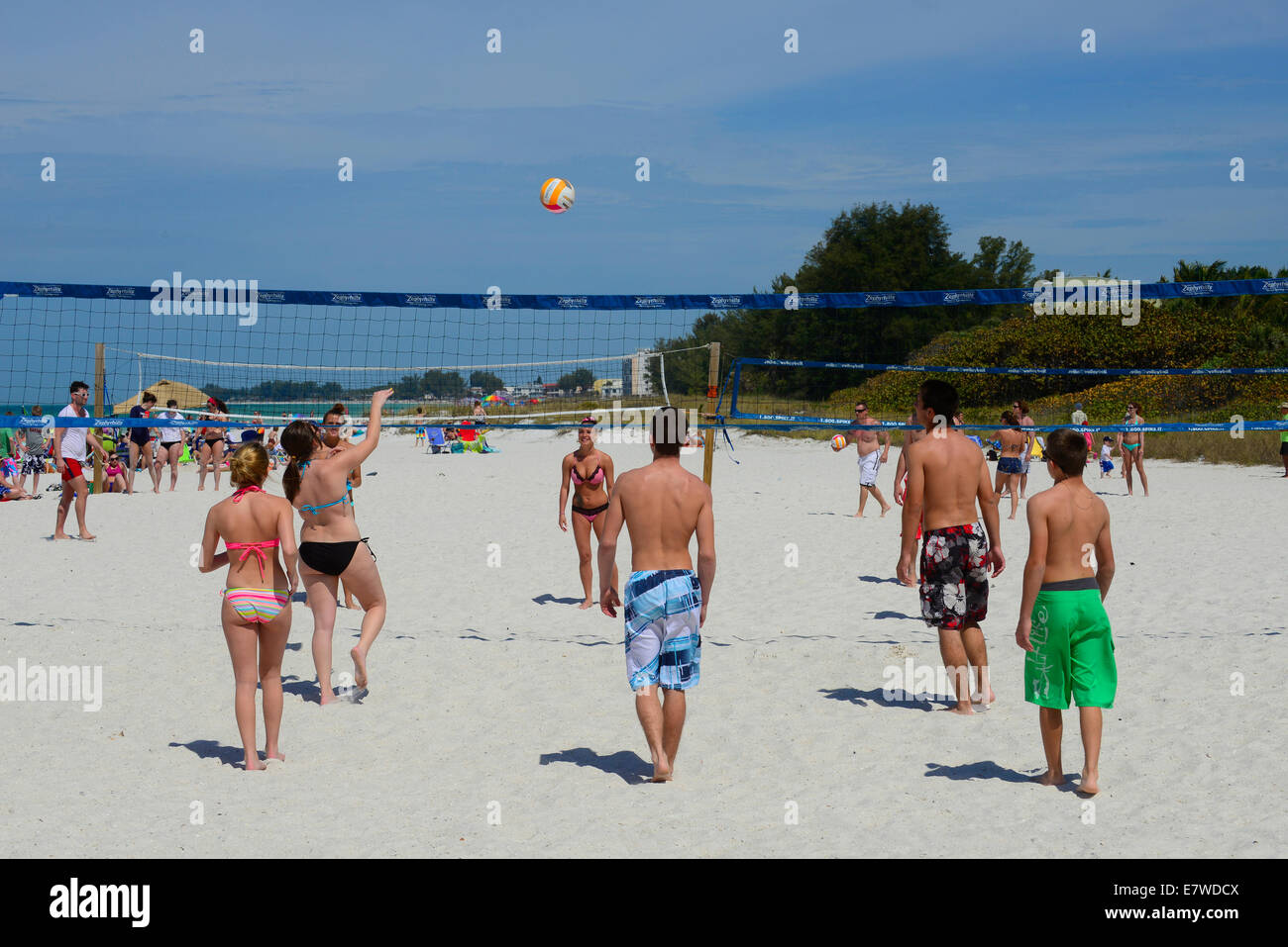 Playing casual volleyball at Bradenton Beach Bradenton Florida FL Stock Photo