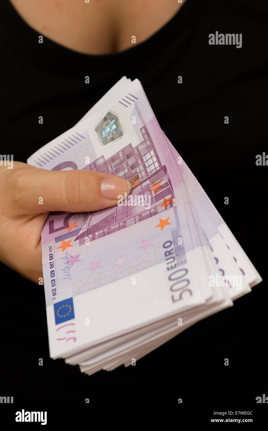 woman counting EUR banknotes Stock Photo