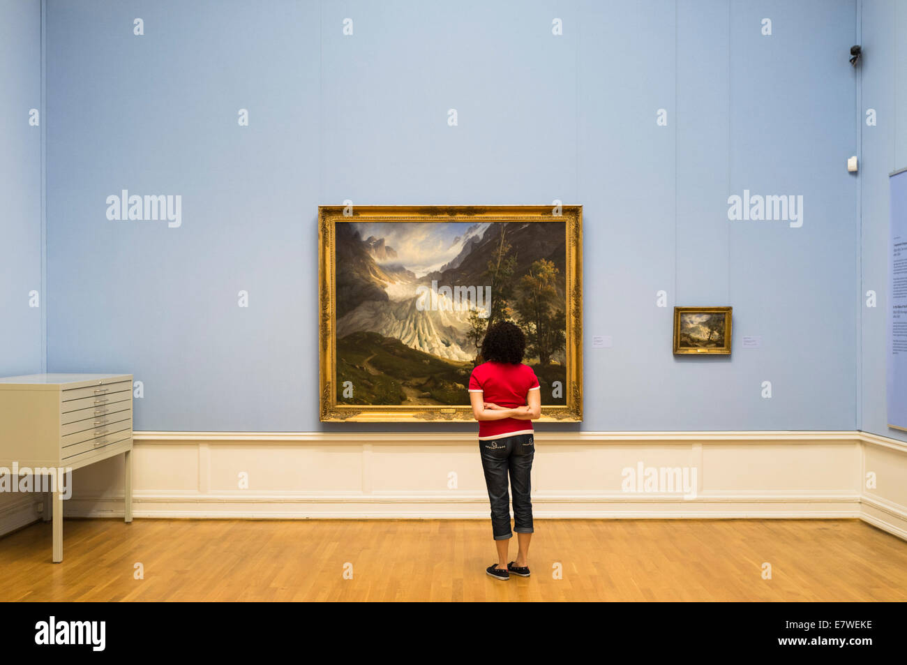 Visitor gazing at Thomas Fearnley´s Grindelwaldbreen and its sketch at the National Gallery of Oslo, Norway Stock Photo