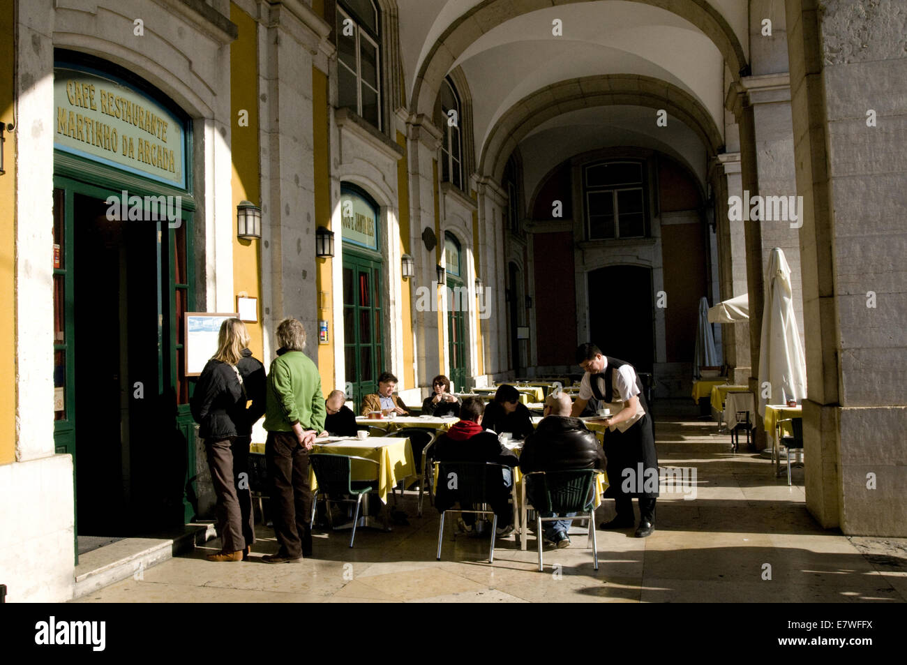 typical Lisbon café in the Praça do Comercio (Café Martinho da Arcada). One of Fernando Pessoa's favorite café. Stock Photo