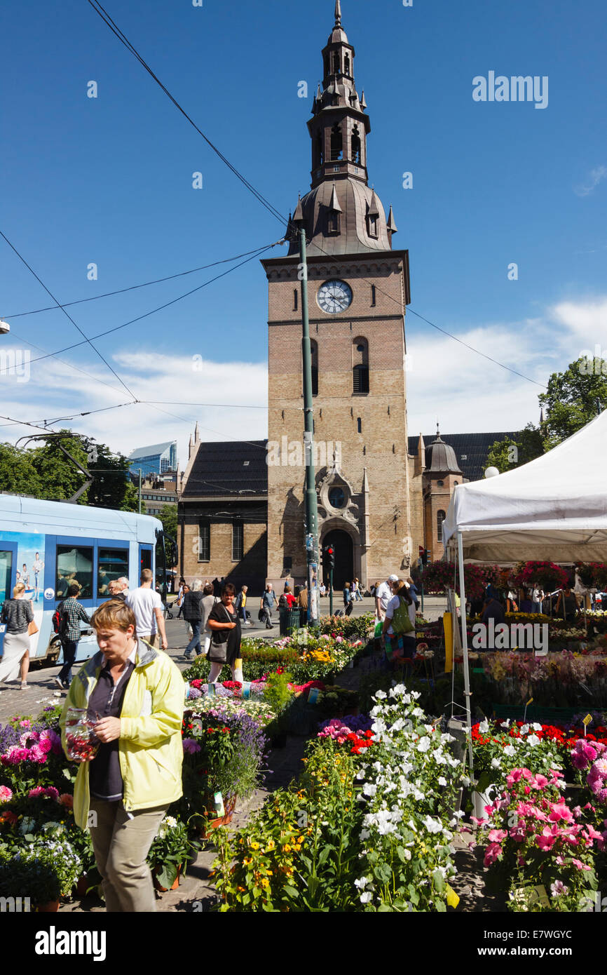 Flowers market and cathedral at Stortorvet square, Oslo, Norway Stock