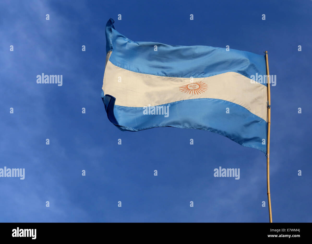 Flag of Argentina against blue sky Stock Photo