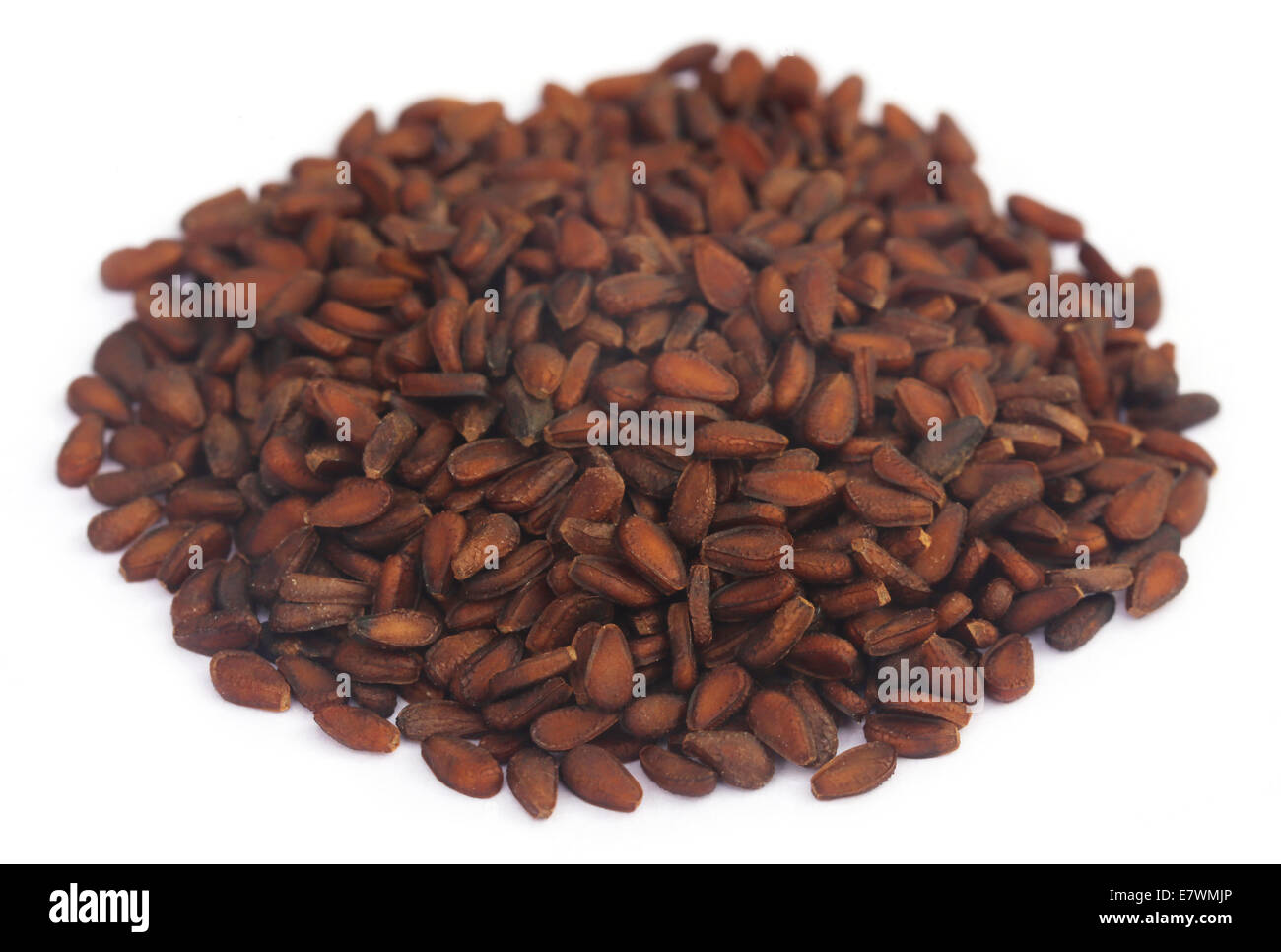 Sesame seeds over white background Stock Photo