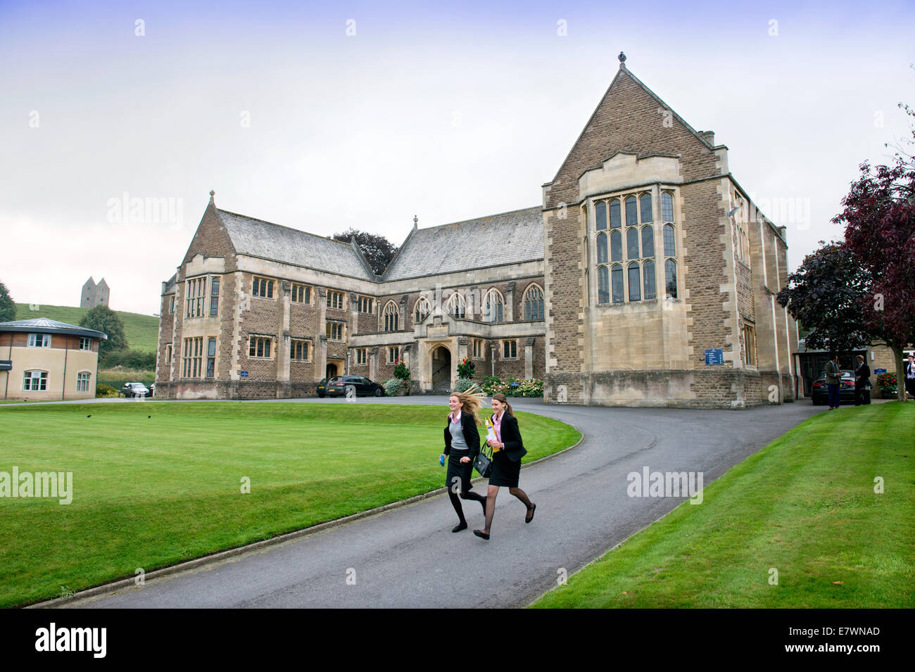 Girls run between lessons at King's School Bruton Stock Photo Alamy