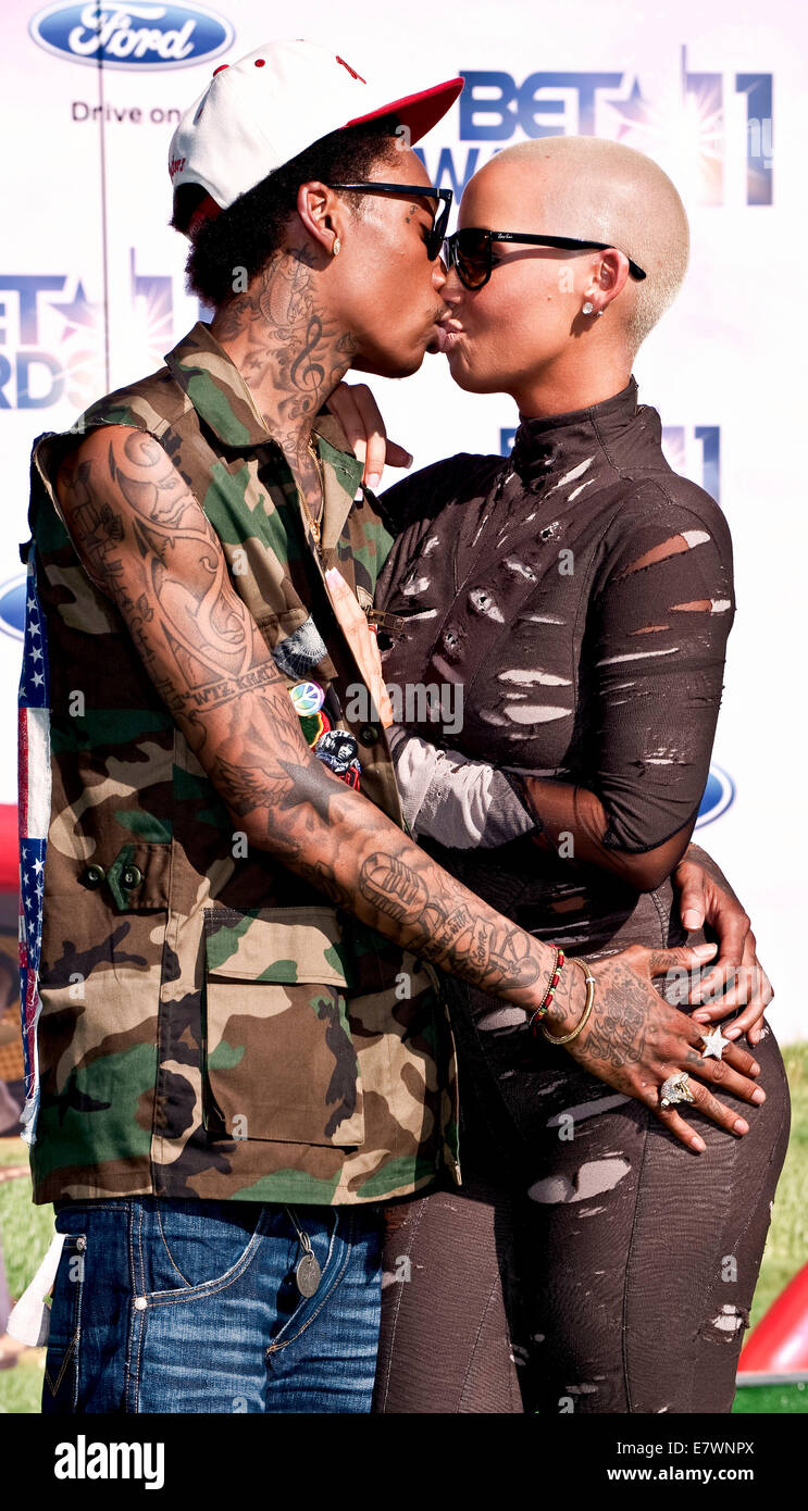 File. 24th Sep, 2014. AMBER ROSEÊhas filed for divorce fromÊrapper WIZ KHALIFA. The pairÊwedÊin 2013 andÊhave a son together. The 30-year-old actress cited irreconcilable differences as the reason for the split. Pictured - June 26, 2011 - Los Angeles, California, USA - Wiz Khalifa and Amber Rose arrive for the BET AWARDS at the Shrine Auditorium. © Brian Cahn/ZUMA Wire/Alamy Live News Stock Photo