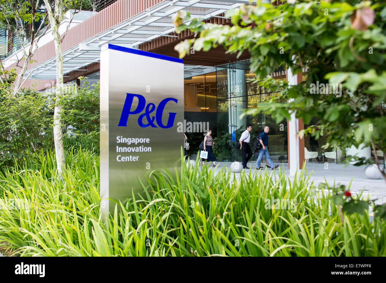 Workers arrive at the Procter & Gamble (P&G) Singapore innovation ...