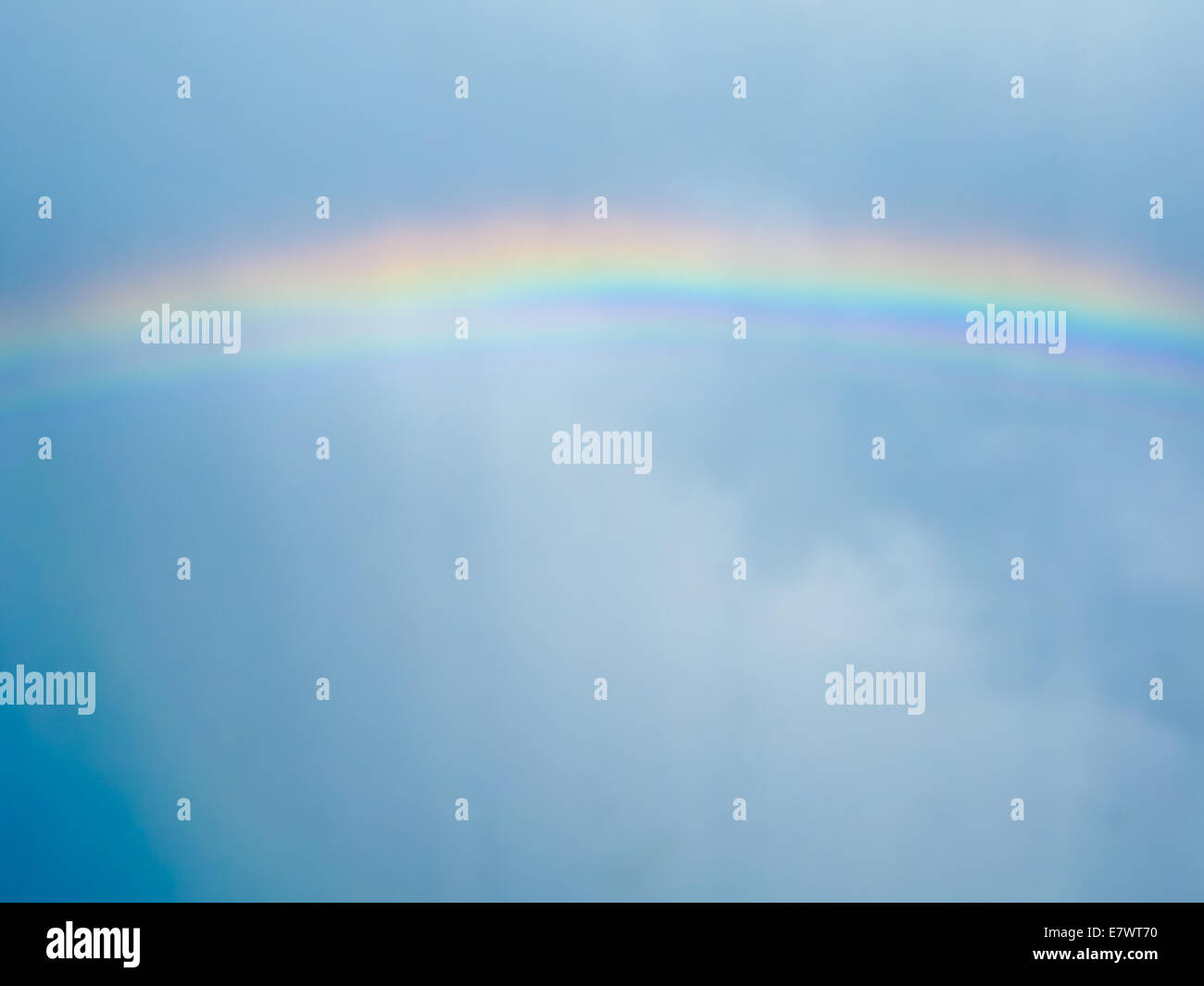 Rainbow across cloudy sky after rain. Stockholm, Sweden Stock Photo - Alamy