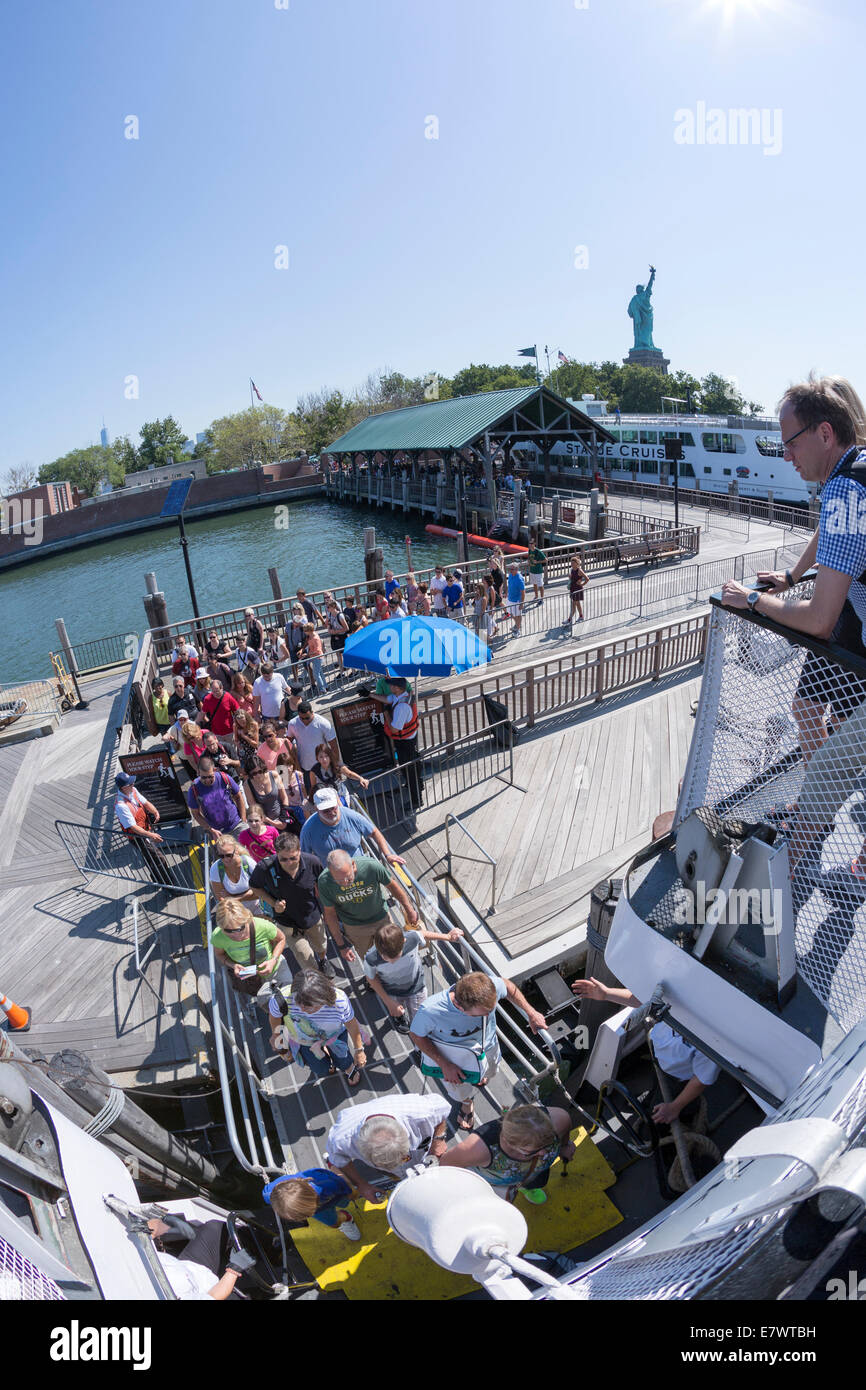 US, New York, Embarking the Liberty Island Ferry boat. Stock Photo