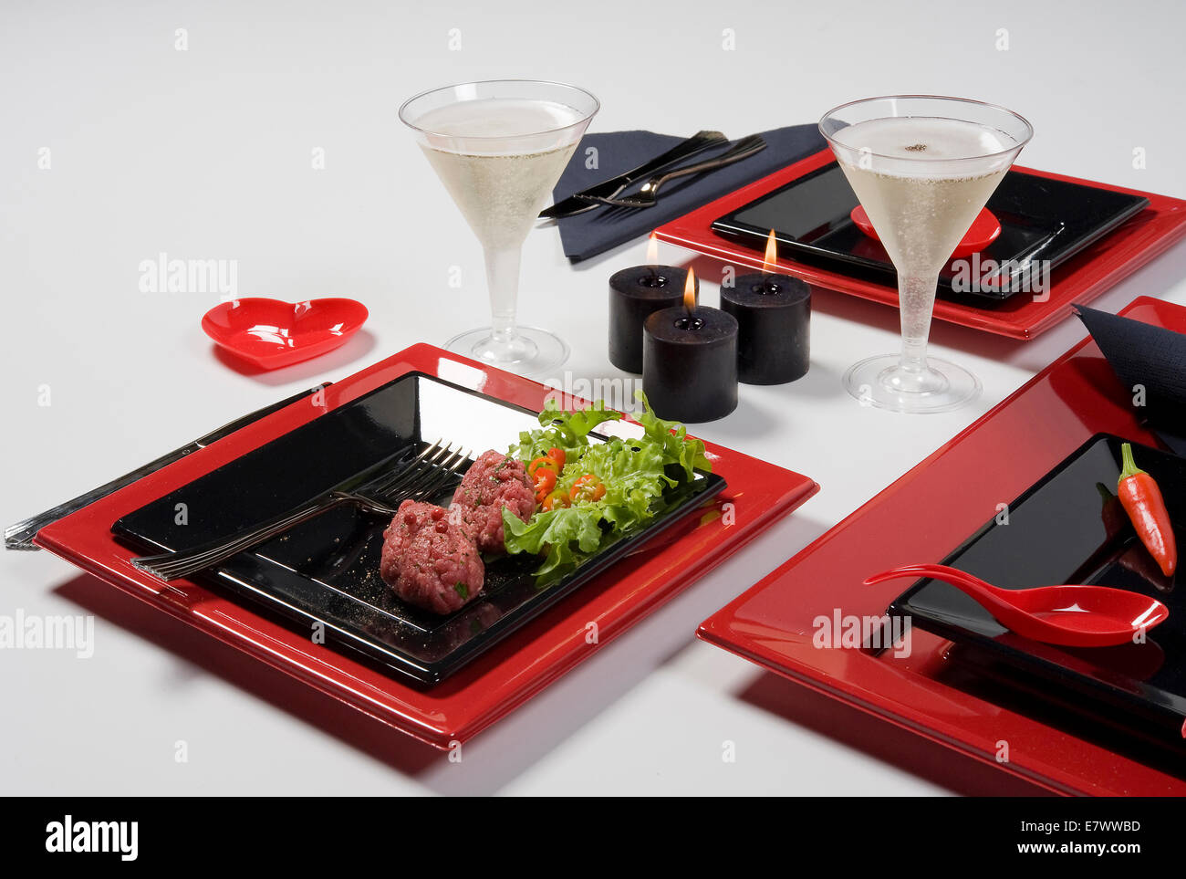 Multicolor table set red and black Stock Photo - Alamy