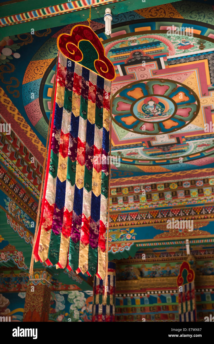 Eastern Bhutan, Trashigang, Rangjung Woesel Choeling Monastery interior, hanging textile Stock Photo