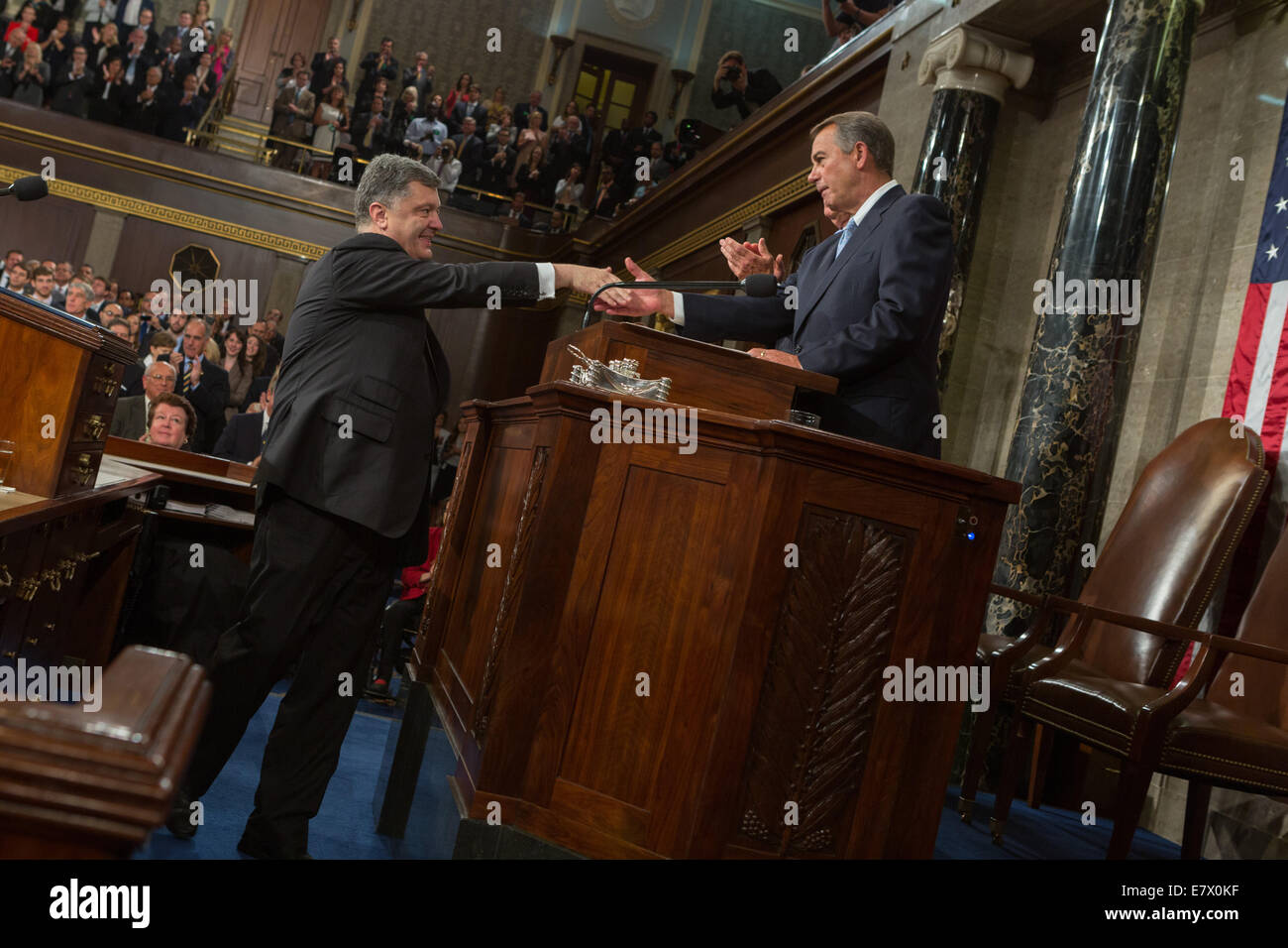 Ukrainian President Petro Poroshenko shakes hands with  Speaker of the House John Boehner before addressing a joint session of the U.S. Congress September 18, 2014 in Washington, DC. Stock Photo