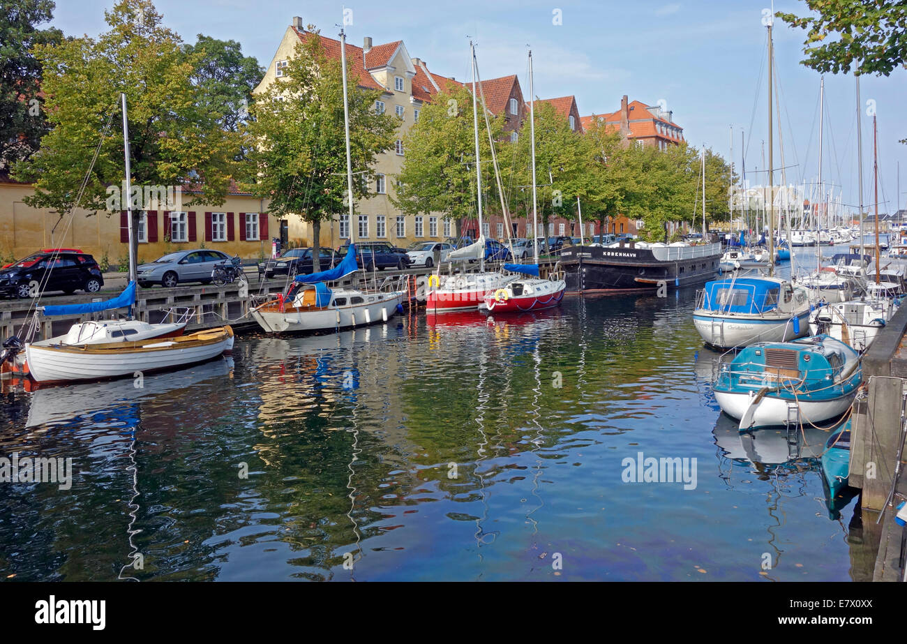 Christianshavn Canal in Copenhagen Denmark with vessels along both quays Stock Photo
