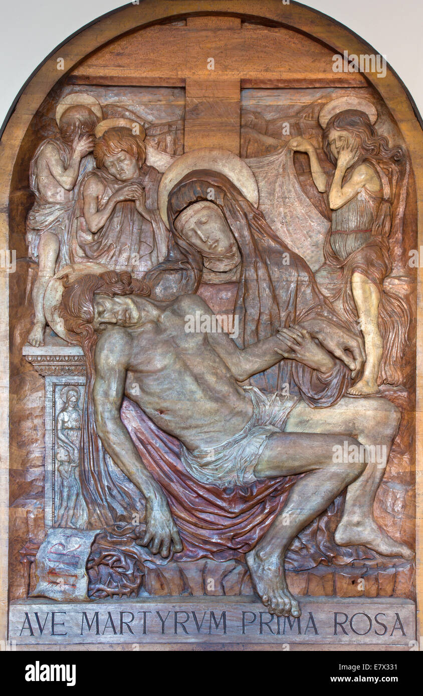 PADUA, ITALY - SEPTEMBER 10, 2014: The relief of Pieta by Amleto Sartori (1940) in church chiesa di Santa Maria del Torresino. Stock Photo