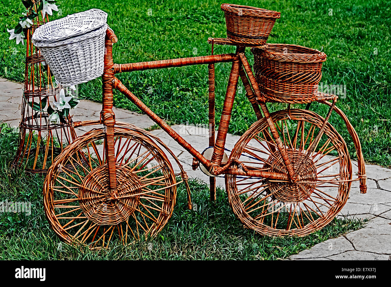 Decorative bike made from twigs and wicker Stock Photo Alamy