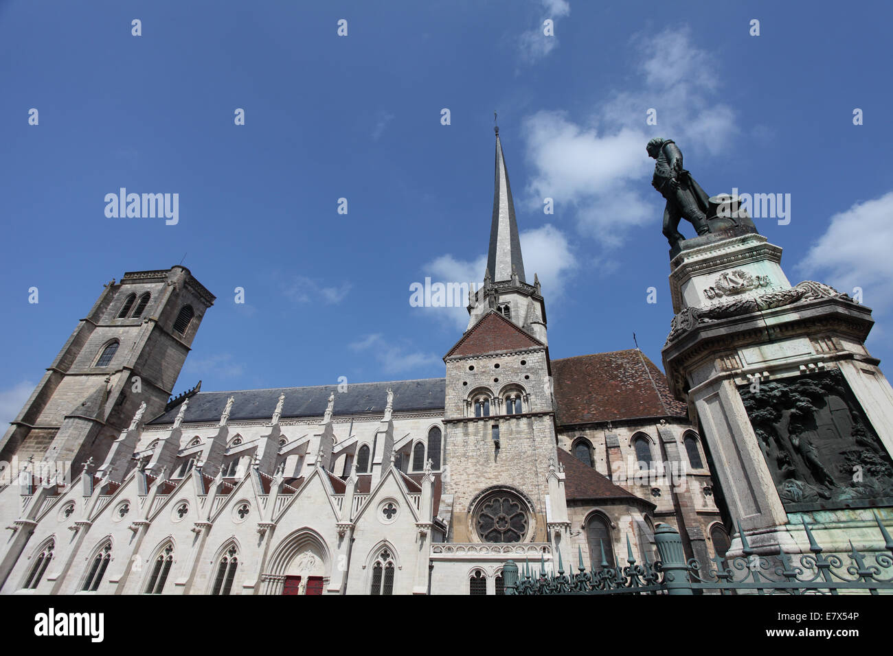 The bronze statue of lieutenant Napoleon Bonaparte and the the church of Notre Dame, Place D'Armes, Auxonne Stock Photo