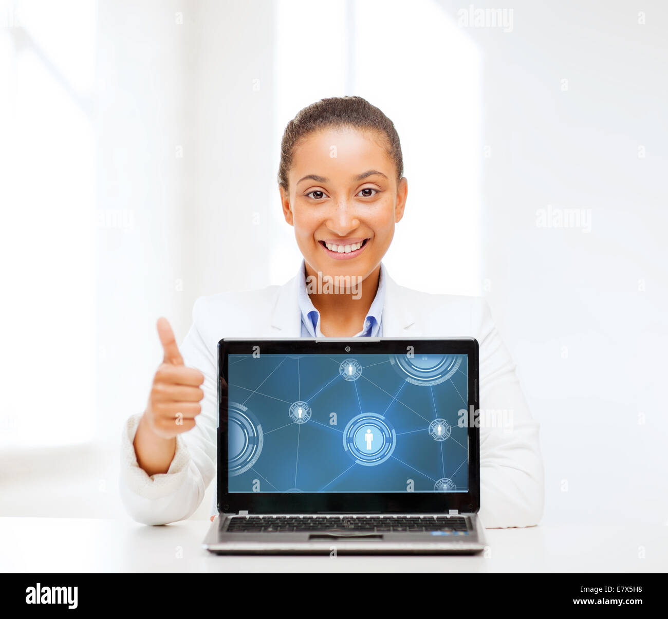 smiling woman with laptop computer Stock Photo - Alamy