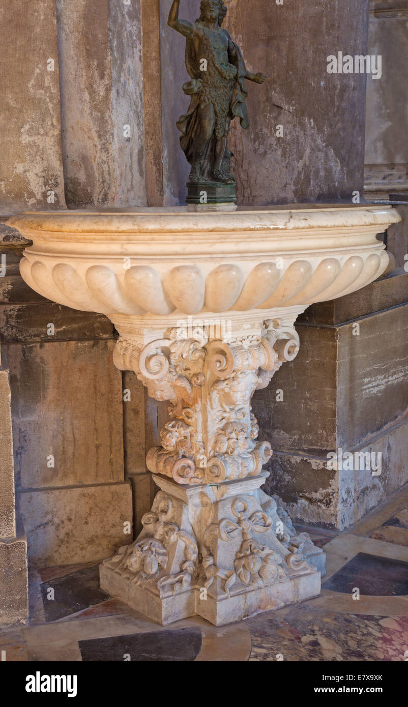 VENICE, ITALY - MARCH 13, 2014: The baroque stoup in church Santa Maria della Salute. Stock Photo