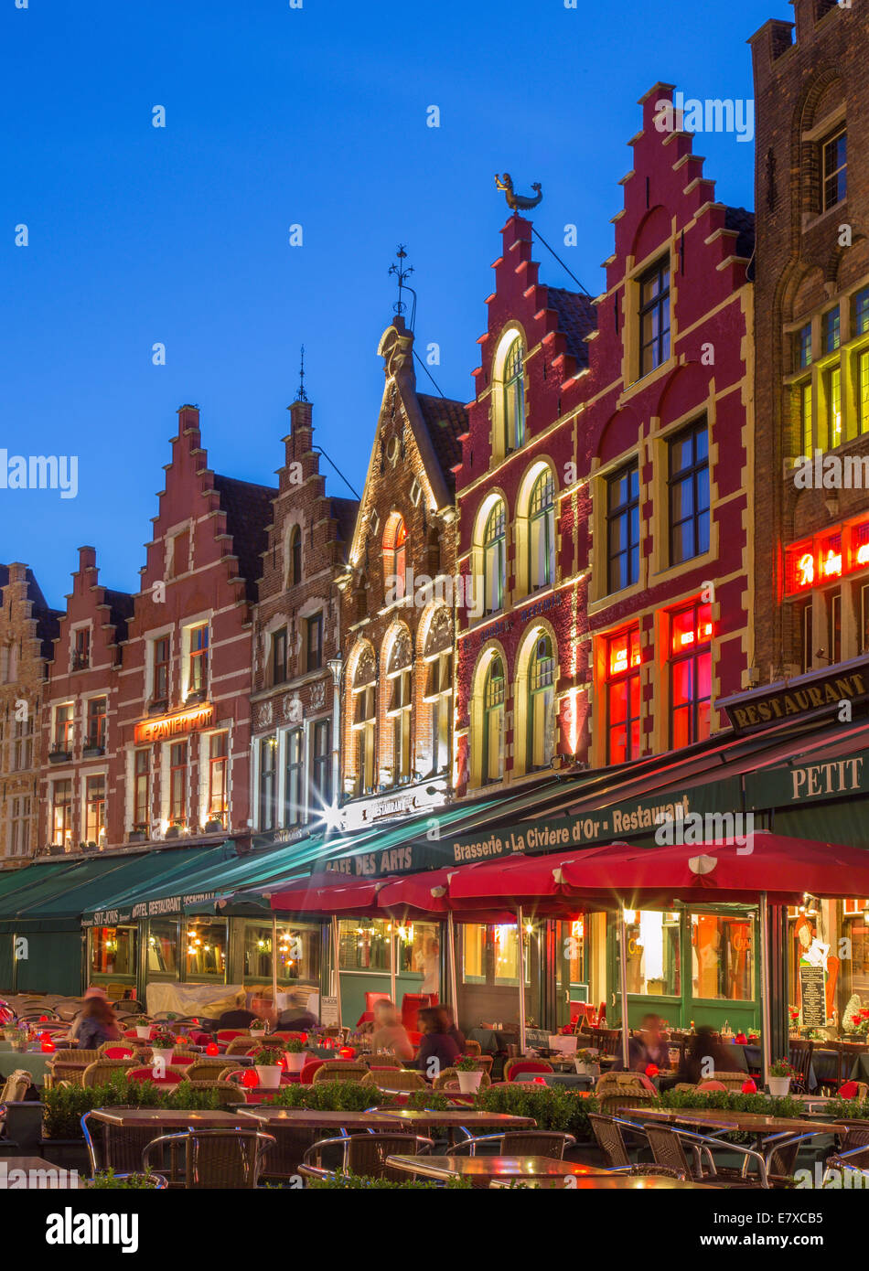 BRUGES, BELGIUM - JUNE 11, 2014: The houses of the Grote Markt square at dusk. Stock Photo