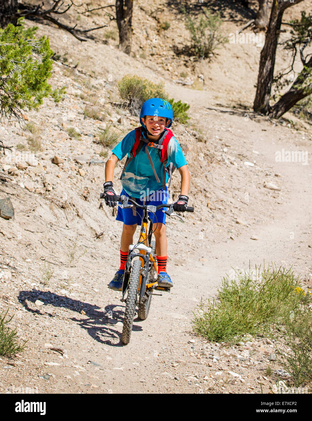 Middle school aged children 10 - 14 mountain biking on the Little Rainbow Trail, Salida, Colorado, USA Stock Photo