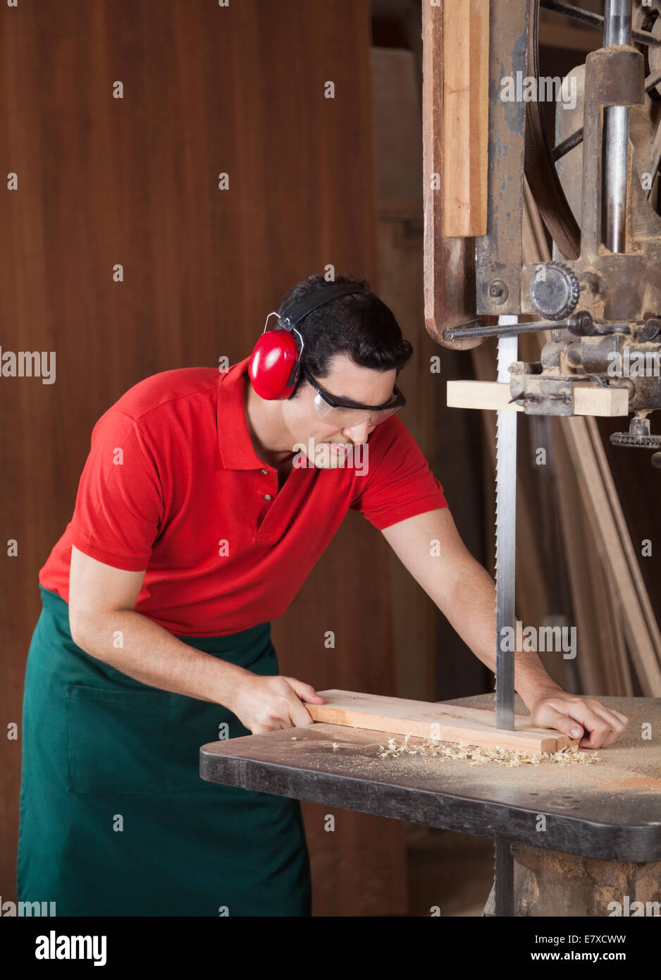 Carpenter Cutting Wood With Bandsaw Stock Photo Alamy