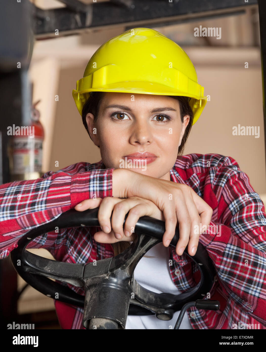 Engineer Leaning On Steering Wheel Of Forklift Stock Photo Alamy