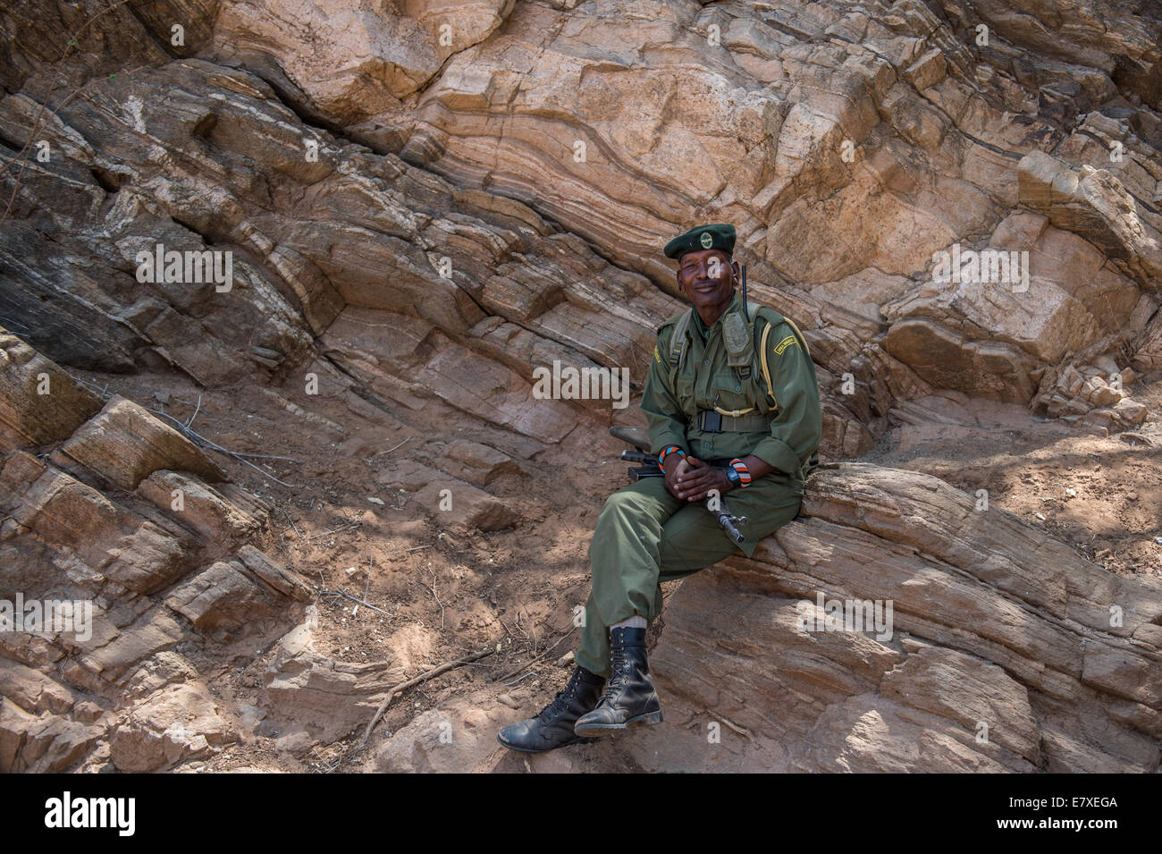 An armed security guard on the Sara Conservancy in Northern Kenya. (Photo by Ami Vitale Stock