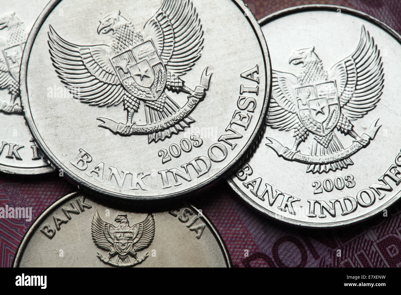 Coins of Indonesia. National emblem of Indonesia called the Garuda Pancasila depicted in Indonesian rupiah coins. Stock Photo