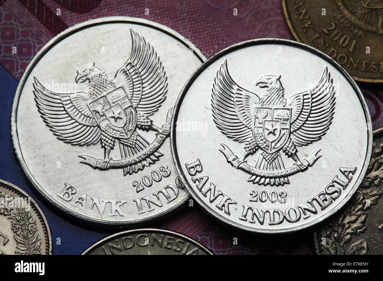 Coins of Indonesia. National emblem of Indonesia called the Garuda  Pancasila depicted in Indonesian rupiah coins Stock Photo - Alamy