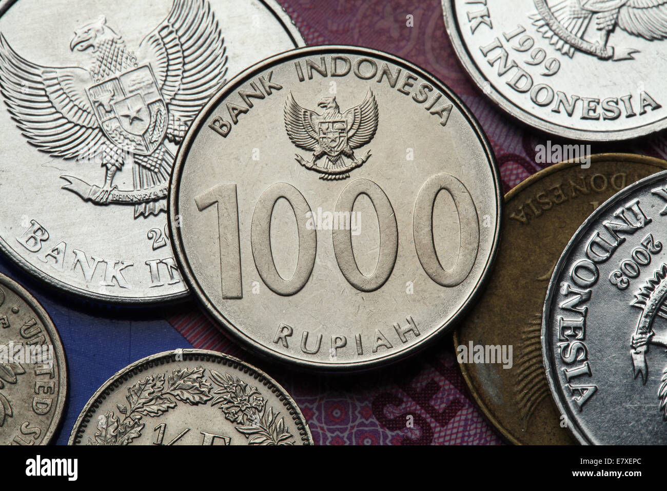 Coins of Indonesia. Indonesian national emblem called the Garuda Pancasila depicted in the Indonesian one thousand rupiah coin. Stock Photo