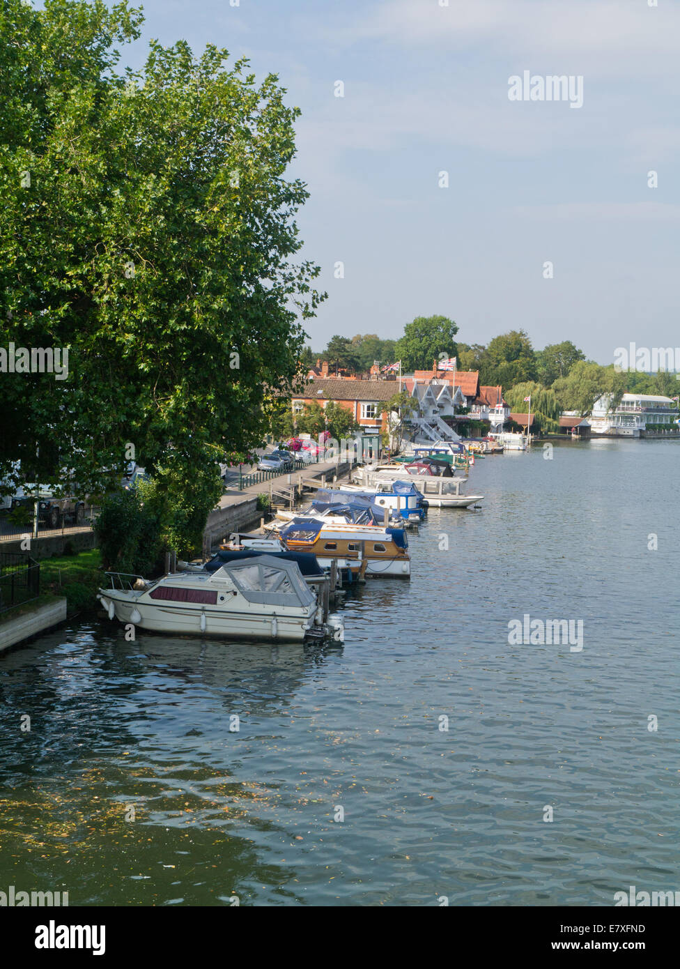 A line of motor boats moored on the River Thames at Henley On Thames, England, Oxfordshire, UK Stock Photo